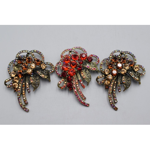 72 - Three Diamante Jewelled Floral Brooches complete with Original Boxes