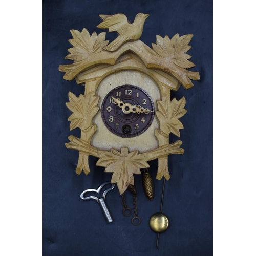 114 - Black Forrest Style Miniature Cuckoo Clock with Key, Pendulum and Box