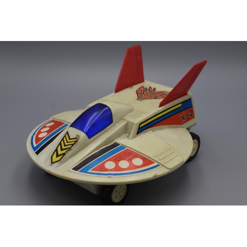 620 - Vintage Jimson Hong Kong X-2 Friction Powered flying Saucer Car with Spark Action. Approx 7 inch Dia... 