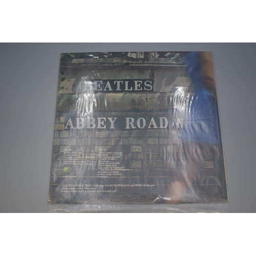 51 - First Press Cover of The Beatles Abbey Road Lp first press has variations on the sleeve. The apple l... 