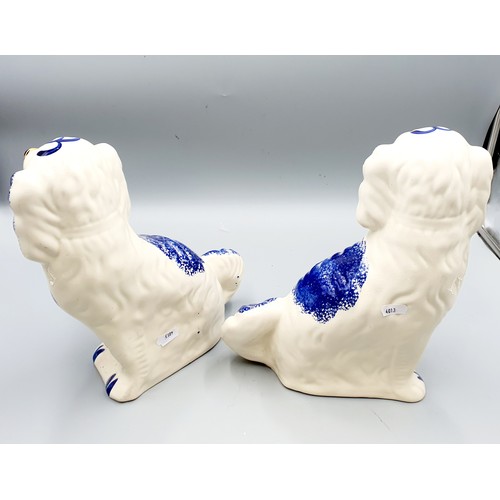 78 - A Pair Of Staffordshire Flat Back Spaniels. Approximately 12