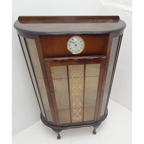 454a - A Sureline Display Cabinet with built in Smiths 30 hour clock. Made by George Serlin and Sons London... 