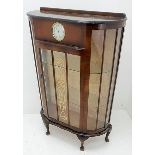 454a - A Sureline Display Cabinet with built in Smiths 30 hour clock. Made by George Serlin and Sons London... 