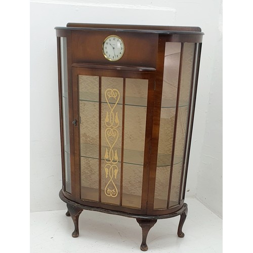 454a - A Sureline Display Cabinet with built in Smiths 30 hour clock. Made by George Serlin and Sons London... 