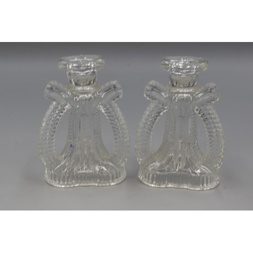 34 - Two Deco Moulded Glass Candle Sticks and Two Glass Paperweights