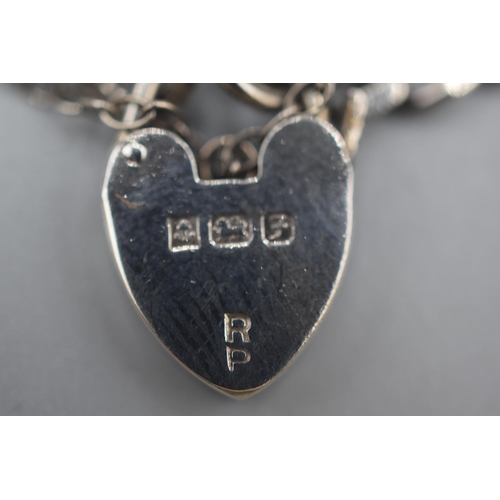 43 - Hallmarked Birmingham Silver Bracelet with 5 Charms