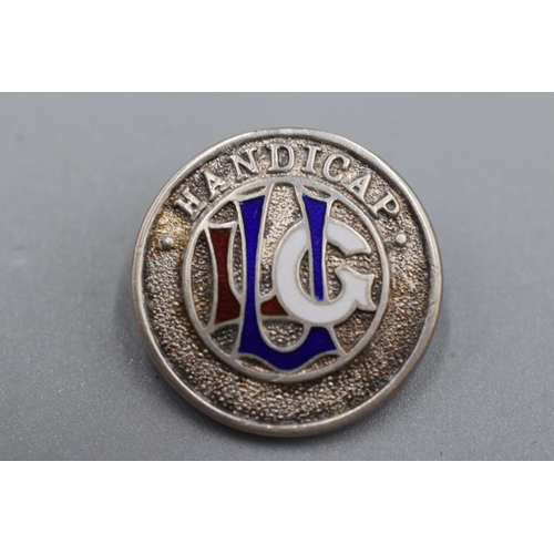 50 - Three Silver Badges / Brooches including Mackintosh Style and Mappin & Webb