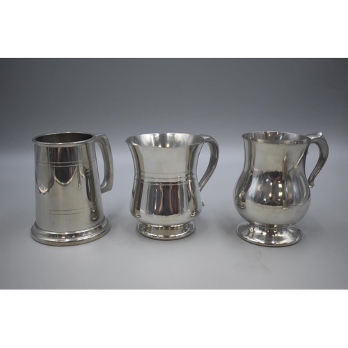 51 - Three Pewter Tankards  and One Silver Plate