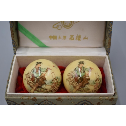 67 - Two Chinese Health Balls in Case