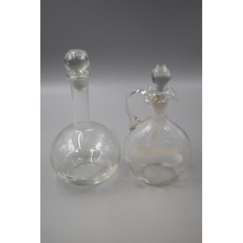 98 - Two Decanters to include one Mary Gregory style