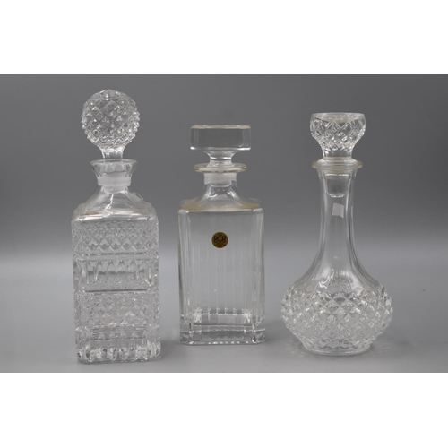 99 - Three Glass Decanters to include Royal Crystal Rock