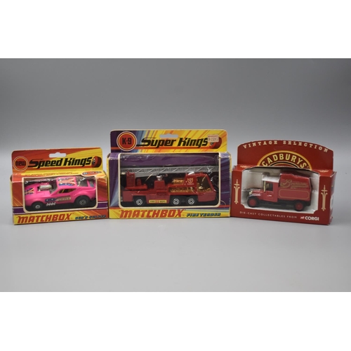 311 - Three Boxed Di-cast Vehicles to include Matchbox Fire Tender and Gus's Gulper plus a Corgi Cadbury's... 