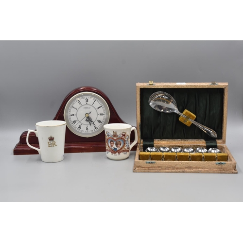 495 - Wood Cased Mantel Clock, Desert Spoon Set and two Commemorative Cups