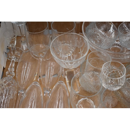 498 - Large Selection of Crystal Glassware including Set of 4 Fruit Bowls, Champagne Flutes and More