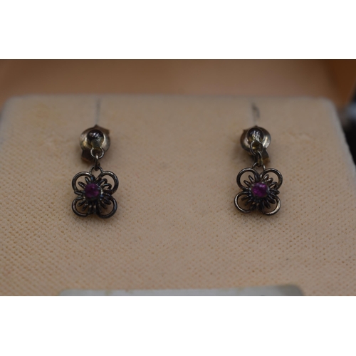 73 - Pair of Silver 925 Ruby Stoned Earrings in original Box