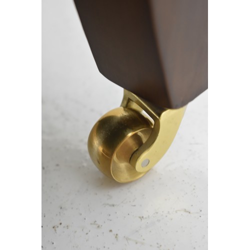 450 - Matching Pair of Cream Arm-Chairs on Four Brass Castors