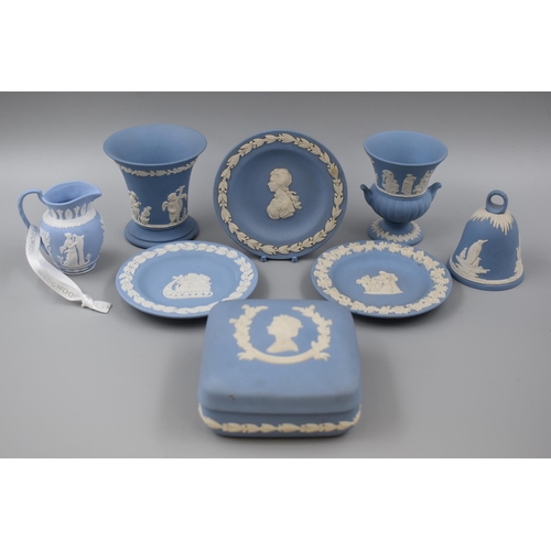 222 - Seven Pieces of Wedgwood Jasperware including Bell, Plates, Vases and More