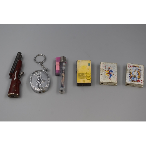 60 - Selection of 6 Collectors Lighters including Shotgun, Playing Guards, Exotic Ladies and More