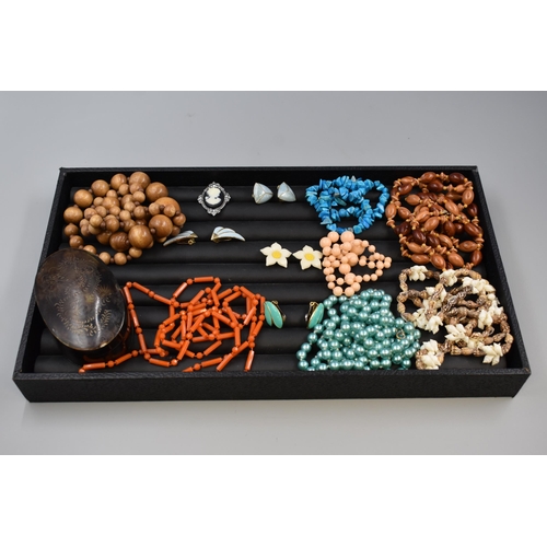 68 - Tray to include bead sets, cameo brooch, tortoise shell effect box and ear rings