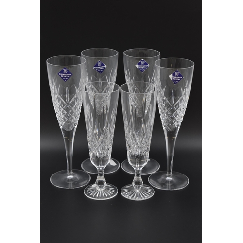 174 - Set of Four Edinburgh Crystal Champagne Flutes and two other Crystal Glasses