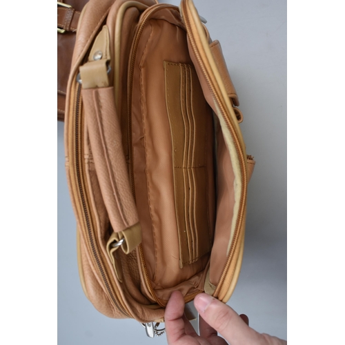 517 - Two new brown leather handbags, one from T&K boutique and one from Lorenz