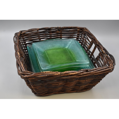 549 - Wicker Basket Containing Selection of Green Glass Candle Plates