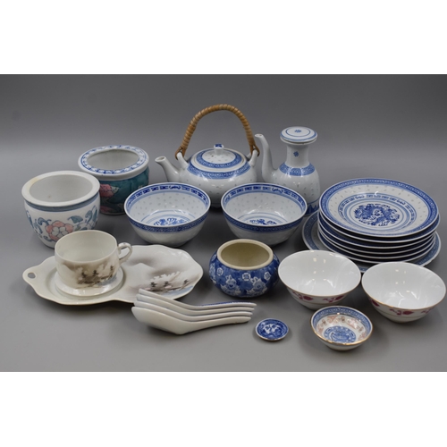 561 - Selection of Oriental Pottery include Rice Bowls, teapots, Spoons and other