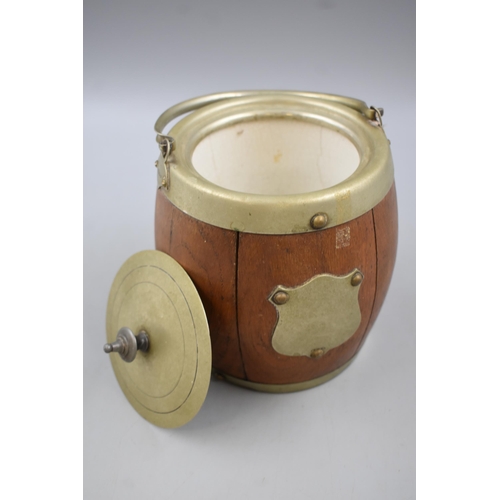 105 - A Silver Plated Biscuit Barrel With Ceramic Inner Lining and Blank Cartouche. Approx 7