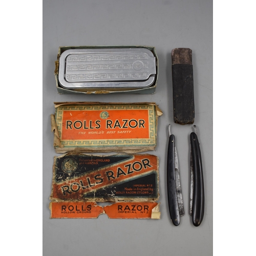 68 - Two Cut Throat Razors and a Rolls Razor in Case