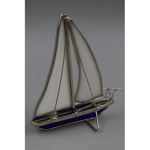 87 - A Metal and Glass Boat Figurine, With Cobalt and Opaque Glass. Approx 5.5