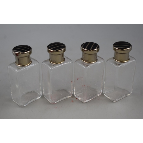 102 - Faux Leather Case containing Four Lidded bottles (probabily for condiments)