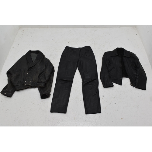 601 - Two Leather Jackets and a Pair of  Leather Trousers