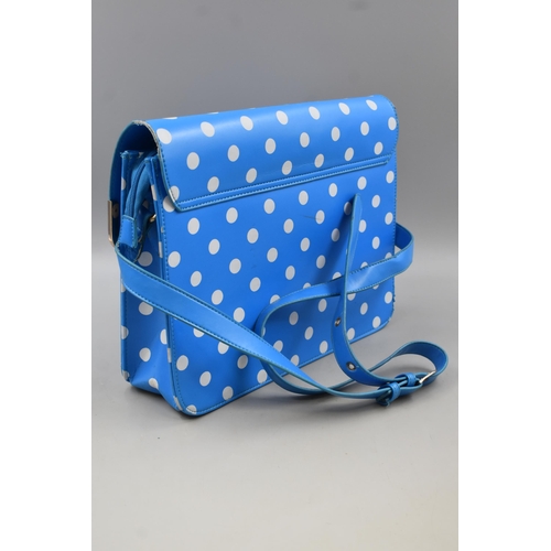 607 - A Ladies HT Fashion Blue and White Polka Dot Bag. Approx 11.5