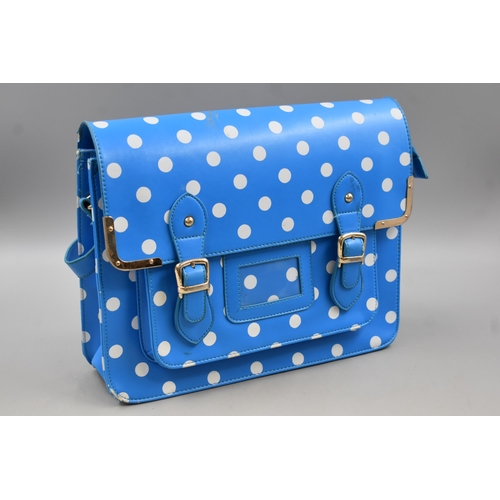 607 - A Ladies HT Fashion Blue and White Polka Dot Bag. Approx 11.5