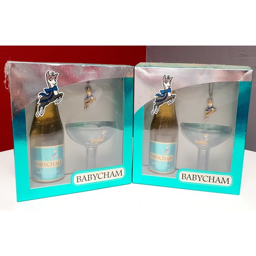 24 - Two Boxed Babycham Sets Includes a Bottle of Babycham, Babycham Glass and a Babycham Keyring in Each... 