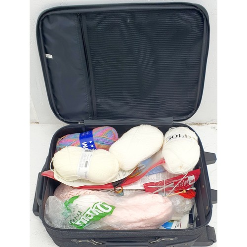 25 - A Suitcase Full of Wool, Knitting Needles and Other