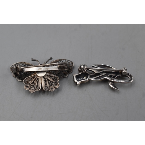 66 - Two Silver Brooches to include Filigree butterfly and Flower