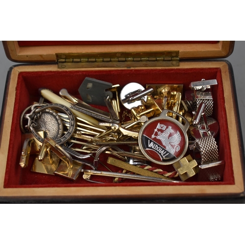 68 - A Landscape Jewellery Box Containing Men's Cufflinks, Tie Clips, Badges and More.