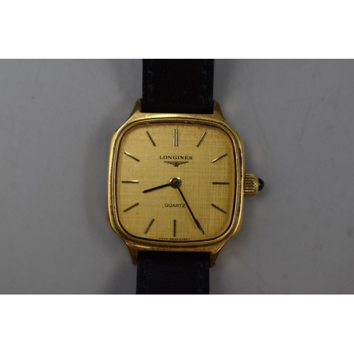 95 - A Ladies Longines Quartz Watch, In Gold With Square Face.