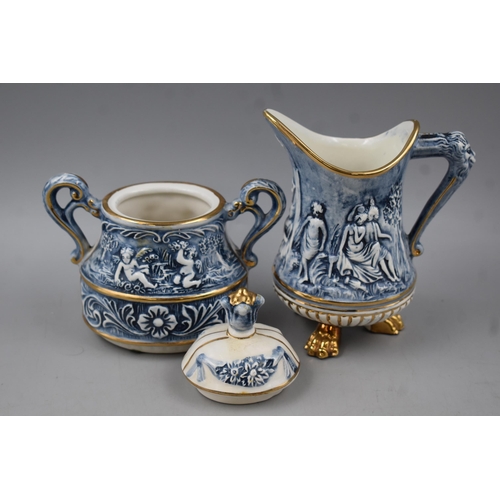 211 - Five Pieces of Capodimonte Italian Cherub themed Porcelain including Coffee Pot, Trinket Box, Lidded... 