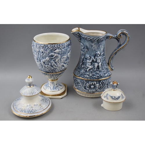 211 - Five Pieces of Capodimonte Italian Cherub themed Porcelain including Coffee Pot, Trinket Box, Lidded... 