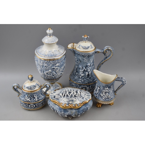 211 - Five Pieces of Capodimonte Italian Cherub themed Porcelain including Coffee Pot, Trinket Box, Lidded... 