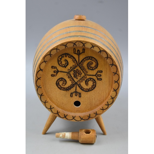 637 - A Small Wooden Whiskey Barrel On Legs, With Carved Designs on the Face. Approx 9