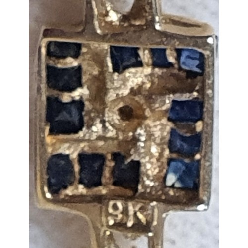 10a - 9ct Gold Stone Set Tie Pin Possibly Sapphire With Diamond Centre Stone.