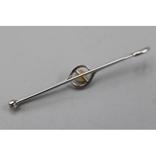 31 - A 9ct White Gold Bar Brooch, With Central Pearl.