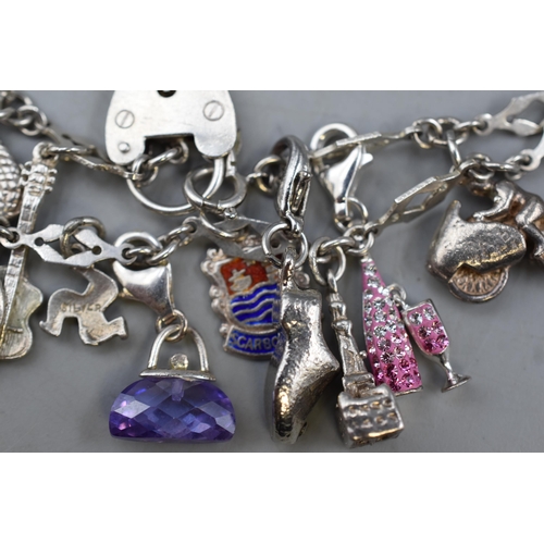 63 - Silver Charm Bracelet complete with 14 Charms