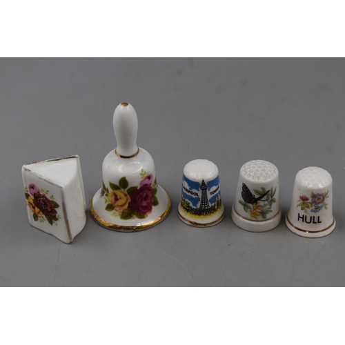 171 - A Mixed Tray Containing a Large Selection of Collectable Ceramic and Metal Thimbles, Ceramic Bells a... 