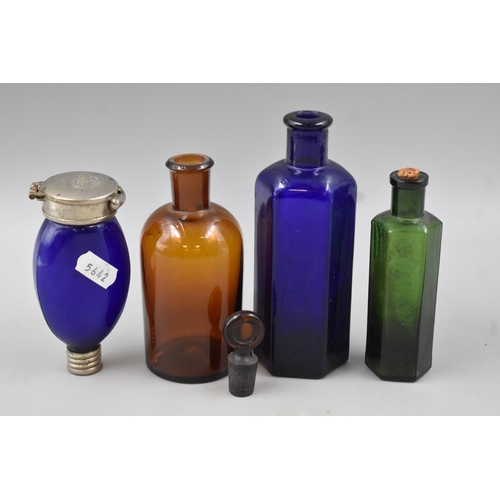 182 - Four Vintage Glass Bottles to Include Rare Mignon