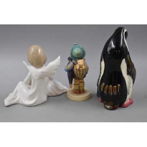 239 - Russian Lomonosov pottery Penguin and baby figure, Goebel Figure and Angel Figure