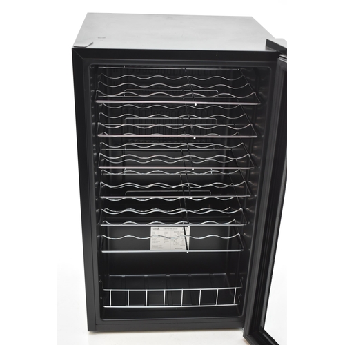 521 - 25 Bottle Wine Cooler Fridge With Illumination and Glass Display Door, Also Has Section at Bottom Fo... 